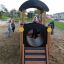 Children playing on the Train playground equipment.