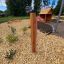 Wooden play megaphone in a children’s playground.