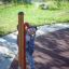 Child playing on Megaphone playground equipment outdoors