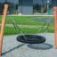 Playground swing BNS Single Swing Robinia 2 Posts with wooden supports and a tire seat.