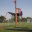 Child climbing the Mast climbing net on a playground.