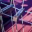 Six Angle with Suspension Bridge single slide playground equipment close-up showing wooden steps and
