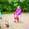 Child playing on an Excavator playground equipment.