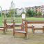 Outdoor wooden adventure playground structure for kids in a park, product named Course.