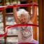 Child playing on the Activity Center with Slide.