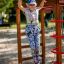 Child playing on an Activity Center with Slide.