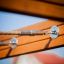 Wooden structure and rope detail of an Activity Center with Slide.