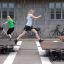 Children jumping on Spring Plate playground equipment in the park.