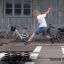 Boy jumping on Spring Plate playground equipment.
