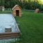 Nature Playhouse and sandbox in a children's playground.
