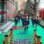 Children running on a school playground.