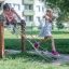 Children playing on Trapezoidal outdoor playground equipment