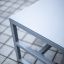 Modern Kyoto Table HPL on tiled ground.