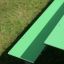 Table & Bench HPL outdoor green surface close-up.