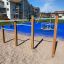 Outdoor playground with Somersault Triple exercise bars.