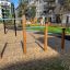 Outdoor Somersault Triple playground equipment in a residential area.