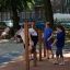 Children playing on Somersault Triple playground equipment