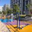 Cross Trainer outdoor gym equipment in a colorful playground.