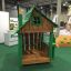 Nill's Playhouse' wooden playhouse at an indoor playground exhibition.