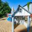 Children's playground with Nill's Playhouse.